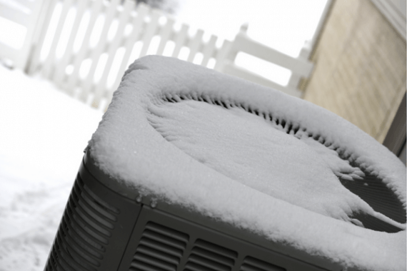 unite exterieure pompe a chaleur sous la neige